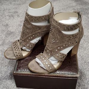 Brand new, never worn taupe colored sandals.
